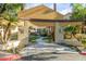 Picturesque entrance walkway with manicured landscaping and a glimpse of community amenities at 11375 E Sahuaro Dr # 2015, Scottsdale, AZ 85259