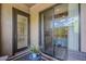 Private balcony with sliding glass doors offering indoor-outdoor living and scenic views at 11640 N Tatum Blvd # 2013, Phoenix, AZ 85028