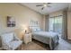 Serene bedroom with a comfortable bed, soft lighting, and a private balcony at 11640 N Tatum Blvd # 2013, Phoenix, AZ 85028