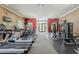 Well-equipped gym with treadmills, weight machines, and large windows at 11640 N Tatum Blvd # 2013, Phoenix, AZ 85028