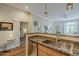 Modern kitchen featuring granite countertops, stainless steel appliances, and an open floor plan at 11640 N Tatum Blvd # 2013, Phoenix, AZ 85028