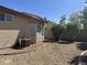 Fully fenced backyard and desert landscaping at 11921 W Madison St, Avondale, AZ 85323