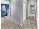 Hallway featuring carpeted floors that connect to other rooms in the house at 12211 W Prickly Pear Trl, Peoria, AZ 85383