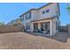 Large backyard with patio seating area for entertaining and low maintenance desert landscaping at 1255 N Arizona Ave # 1251, Chandler, AZ 85225