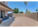 Outdoor seating area under covered patio, set in a low maintenance gravel backyard at 1255 N Arizona Ave # 1251, Chandler, AZ 85225