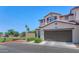Attractive two-story home featuring a well-manicured lawn and a two-car garage at 1255 N Arizona Ave # 1251, Chandler, AZ 85225