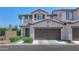 Attractive two-story home featuring a well-manicured lawn and a two-car garage at 1255 N Arizona Ave # 1251, Chandler, AZ 85225