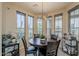 Breakfast nook features many windows and natural lighting with decor at 12738 W Brookhart Way, Peoria, AZ 85383