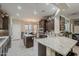 Modern kitchen with stainless appliances, granite counters and a center island at 12738 W Brookhart Way, Peoria, AZ 85383