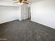 Bright bedroom featuring soft carpet, closet and neutral paint at 12801 N El Frio St, El Mirage, AZ 85335