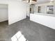 Bright loft space featuring neutral walls, plush carpeting, and views from the window at 12801 N El Frio St, El Mirage, AZ 85335