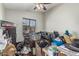 Bedroom with window and ceiling fan at 1350 S Greenfield Rd # 2159, Mesa, AZ 85206