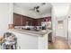 Well-equipped kitchen featuring granite countertops and stainless steel appliances, perfect for cooking at 1350 S Greenfield Rd # 2159, Mesa, AZ 85206