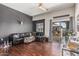 Cozy living room with a large window and sliding glass door creating a bright and airy space at 1350 S Greenfield Rd # 2159, Mesa, AZ 85206