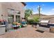 Paver patio with built-in BBQ, desert landscaping, and view of local mountain at 1365 N Drexel St, Mesa, AZ 85207