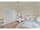 Comfortable bedroom featuring a makeup vanity, ample closet space, and soft, stylish bedding at 1365 N Drexel St, Mesa, AZ 85207