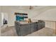 Cozy loft featuring a large sectional couch, a ceiling fan, and a TV at 1365 N Drexel St, Mesa, AZ 85207