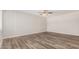 Bedroom with hardwood floors, neutral paint, and natural light at 1407 E 1St St, Mesa, AZ 85203
