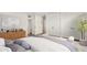 Comfortable bedroom with a stylish furniture and ample closet space at 1407 E 1St St, Mesa, AZ 85203