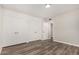 Bedroom with wood-look floors and built-in storage at 1407 E 1St St, Mesa, AZ 85203