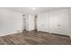 Spacious bedroom with hardwood floors and built in closets providing ample storage at 1407 E 1St St, Mesa, AZ 85203