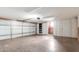 Spacious two-car garage featuring a bright interior and an automatic door at 1407 E 1St St, Mesa, AZ 85203