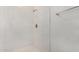 White tiled shower with updated showerhead at 1407 E 1St St, Mesa, AZ 85203
