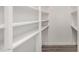 Bright walk-in closet with custom open shelving to keep your wardrobe organized at 1407 E 1St St, Mesa, AZ 85203