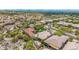 Desert neighborhood aerial view features houses with pools and landscaped yards, offering privacy in a serene environment at 15953 N 111Th Way, Scottsdale, AZ 85255