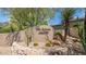 Attractive community entrance sign amidst desert landscaping, creating a welcoming first impression at 15953 N 111Th Way, Scottsdale, AZ 85255