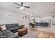 Open-concept layout combining the living room, dining area, and kitchen for seamless flow at 16284 W Desert Mirage Dr, Surprise, AZ 85379