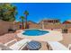 Beautiful backyard pool area with comfortable lounge chairs and a peaceful ambiance at 16284 W Desert Mirage Dr, Surprise, AZ 85379