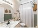 Stylish bathroom featuring a vanity, mirror, and charming decor for a cozy feel at 16404 S 18Th Dr, Phoenix, AZ 85045