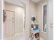 Inviting foyer with white front door, hall closet, console table and neutral decor at 16404 S 18Th Dr, Phoenix, AZ 85045