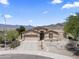 Charming single-story home featuring a desert landscape, attached garage, and beautiful mountain views at 16404 S 18Th Dr, Phoenix, AZ 85045