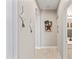Inviting hallway featuring modern decor and a view into the stylish bathroom at 16404 S 18Th Dr, Phoenix, AZ 85045