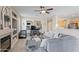 Inviting living room with a fireplace and open view to the kitchen, creating a great space at 16404 S 18Th Dr, Phoenix, AZ 85045