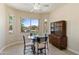 Charming breakfast nook featuring backyard views and tile flooring at 16716 W Rincon Peak Dr, Surprise, AZ 85387