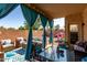 Cozy backyard patio with stylish curtains and comfortable seating arrangement at 17413 W Mandalay Ln, Surprise, AZ 85388