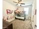 Bedroom with ceiling fan and a bunk bed setup at 18230 W Poston Dr, Surprise, AZ 85387