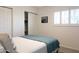 Bedroom featuring closet, decorative art, and overhead lighting at 1894 E Julie Dr, Tempe, AZ 85283