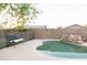Tranquil backyard showcasing a swimming pool, mature trees, and lounge seating at 1894 E Julie Dr, Tempe, AZ 85283