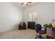Spacious bedroom with large window, neutral carpet, and desk space at 20801 N 90Th Pl # 157, Scottsdale, AZ 85255