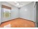 Bedroom with neutral walls, a ceiling fan, and a window offering natural light at 2229 S 82Nd Ln, Phoenix, AZ 85043