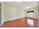 Bedroom features a window, neutral walls, and access to the rest of the home at 2229 S 82Nd Ln, Phoenix, AZ 85043