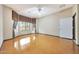 Bedroom features neutral walls, ceiling fan, and a bay window offering natural light at 2229 S 82Nd Ln, Phoenix, AZ 85043