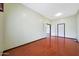 Bedroom features a open doorway, neutral walls, and access to other rooms at 2229 S 82Nd Ln, Phoenix, AZ 85043
