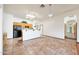 Kitchen area features lots of storage space, tiled floors and an open access layout at 2229 S 82Nd Ln, Phoenix, AZ 85043