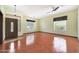 Bright living room featuring decorative ceiling fan, and windows bringing in lots of natural light at 2229 S 82Nd Ln, Phoenix, AZ 85043