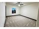 Well lit bedroom with neutral carpet, modern trim, and bright natural light at 22504 W Meade Ln, Buckeye, AZ 85326